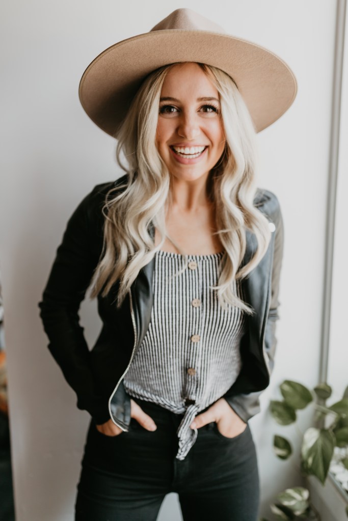 Woman (Nikki Collette) smiling into camera